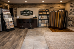 Showroom interior of Foothills Flooring & Tile, a trusted Flooring Company in Hebron, ME, displaying vinyl plank, indoor tile, and carpet flooring options